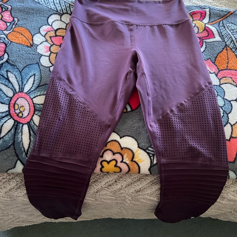 Burgundy Zyia Legging size 4 but fits like a 2. Very tight fitting